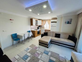 HİSAR MAHALLESİ'NDE 7/24 GÜVENLİKLİ, HAVUZLU SİTEDE GENİŞ BALKONLU EŞYALI SATILIK 2+1 DAİRE