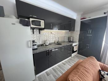 DİDİM ÇAMLIK MAHALLESİ’NDE,EŞYALI, HAVUZ CEPHELİ, DENİZE YÜRÜME MESAFESİNDE SATILIK 2+1 DAİRE