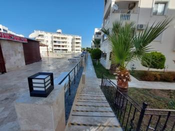 DİDİM ÇAMLIK MAHALLESİ’NDE,EŞYALI, HAVUZ CEPHELİ, DENİZE YÜRÜME MESAFESİNDE SATILIK 2+1 DAİRE