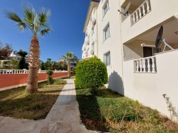 DİDİM ÇAMLIK MAHALLESİ’NDE,EŞYALI, HAVUZ CEPHELİ, DENİZE YÜRÜME MESAFESİNDE SATILIK 2+1 DAİRE