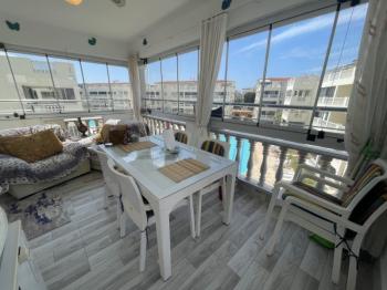 DİDİM ÇAMLIK MAHALLESİ’NDE,EŞYALI, HAVUZ CEPHELİ, DENİZE YÜRÜME MESAFESİNDE SATILIK 2+1 DAİRE