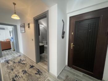 DİDİM ÇAMLIK MAHALLESİ’NDE,EŞYALI, HAVUZ CEPHELİ, DENİZE YÜRÜME MESAFESİNDE SATILIK 2+1 DAİRE