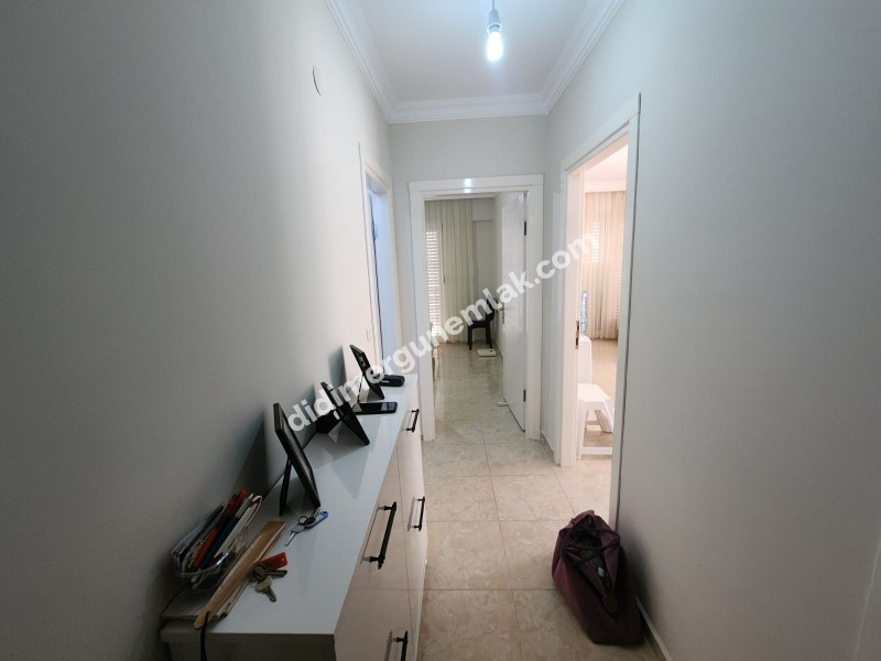 DİDİM ÇAMLIK MAHALLESİNDE DENİZE YAKIN MASRAFSIZ GENİS TERASLI 3+1 SATILIK DUBLEKS