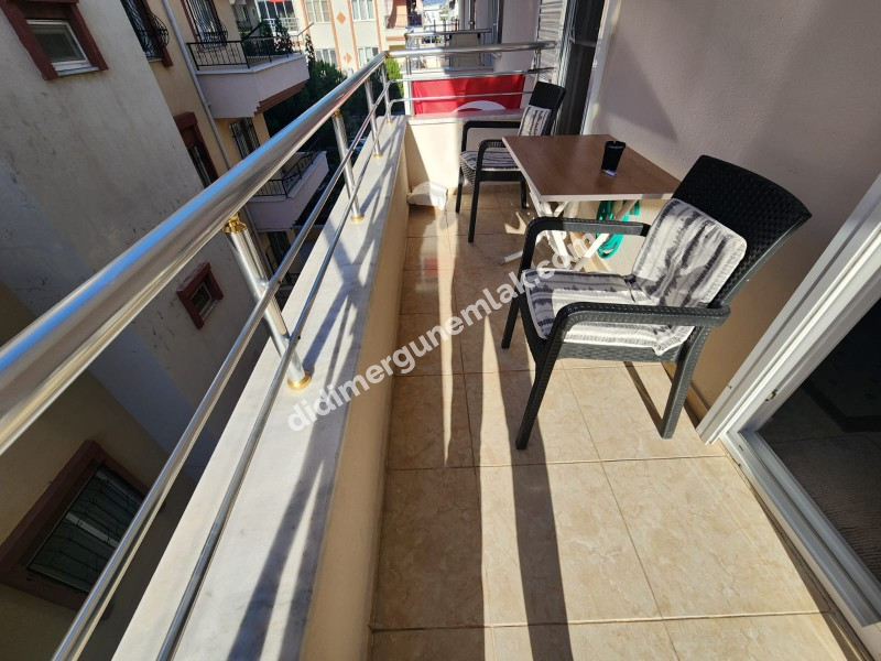 DİDİM ÇAMLIK MAHALLESİNDE DENİZE YAKIN MASRAFSIZ GENİS TERASLI 3+1 SATILIK DUBLEKS