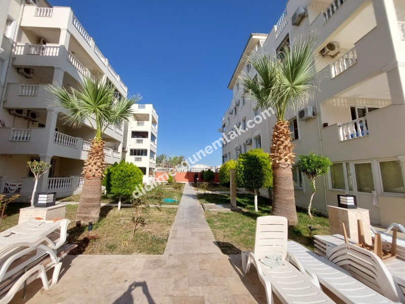 DİDİM ÇAMLIK MAHALLESİ’NDE,EŞYALI, HAVUZ CEPHELİ, DENİZE YÜRÜME MESAFESİNDE SATILIK 2+1 DAİRE