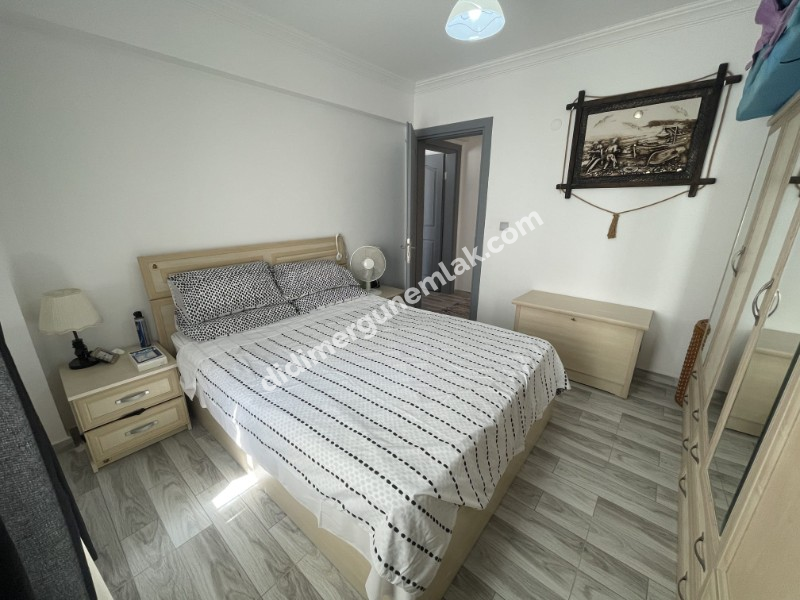 DİDİM ÇAMLIK MAHALLESİ’NDE,EŞYALI, HAVUZ CEPHELİ, DENİZE YÜRÜME MESAFESİNDE SATILIK 2+1 DAİRE