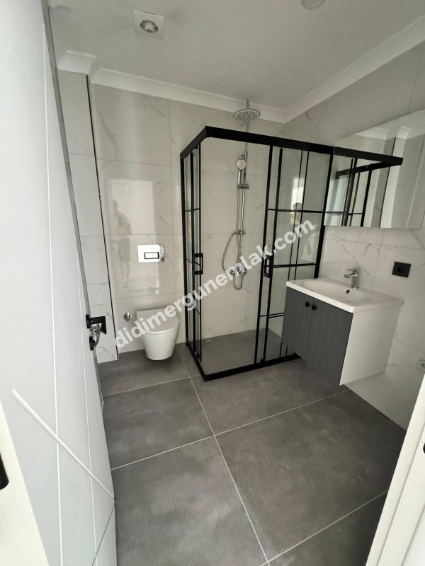 DİDİM YENİ MAHALLE’DE SIFIR, GİRİŞ KATTA, 2+1 SATILIK DAİRE