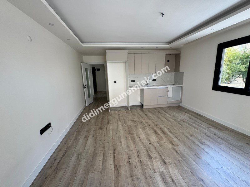 DİDİM YENİ MAHALLE’DE SIFIR, GİRİŞ KATTA, 2+1 SATILIK DAİRE