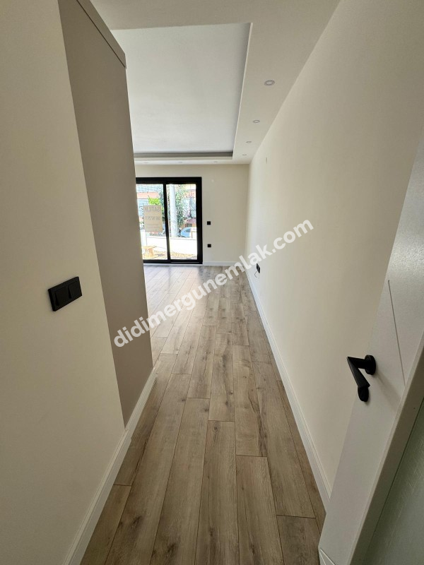 DİDİM YENİ MAHALLE’DE SIFIR, GİRİŞ KATTA, 2+1 SATILIK DAİRE
