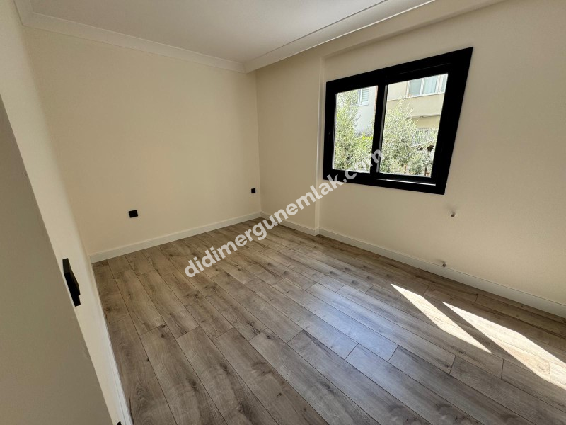 DİDİM YENİ MAHALLE’DE SIFIR, GİRİŞ KATTA, 2+1 SATILIK DAİRE