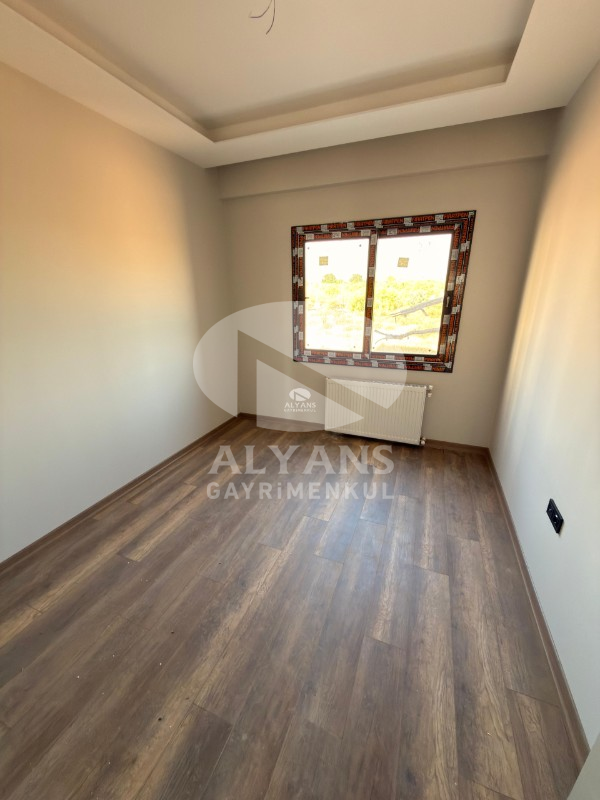 ALYANS'TAN MERKEZ MH.'DE TEK BLOK JENERATÖRLÜ OTOPARKLI 2+1