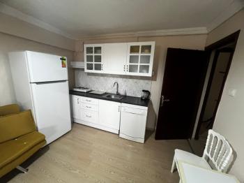 BOSTANLI MERKEZİ KONUMDA 1+1 EŞYALI KİRALIK DAİRE