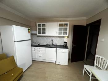 BOSTANLI MERKEZİ KONUMDA 1+1 EŞYALI KİRALIK DAİRE