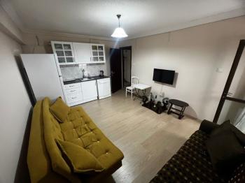 BOSTANLI MERKEZİ KONUMDA 1+1 EŞYALI KİRALIK DAİRE