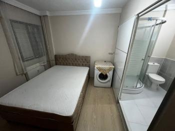 BOSTANLI MERKEZİ KONUMDA 1+1 EŞYALI KİRALIK DAİRE