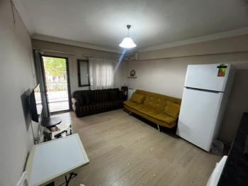 BOSTANLI MERKEZİ KONUMDA 1+1 EŞYALI KİRALIK DAİRE