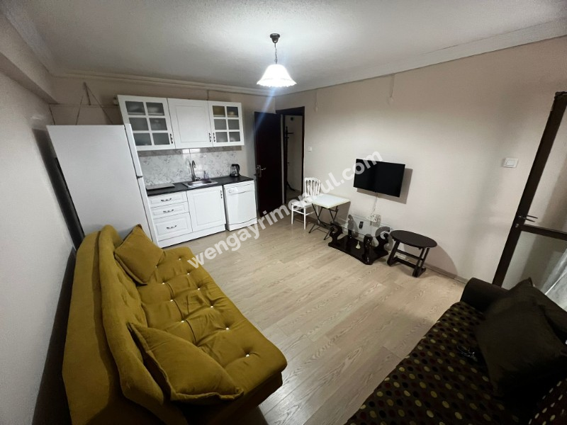 BOSTANLI MERKEZİ KONUMDA 1+1 EŞYALI KİRALIK DAİRE