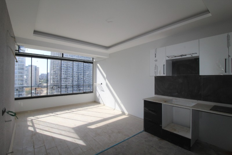 ASLAN'DAN TÖMÜK'TE SİTE İÇİ HAVUZLU SIFIR SATILIK 1+1