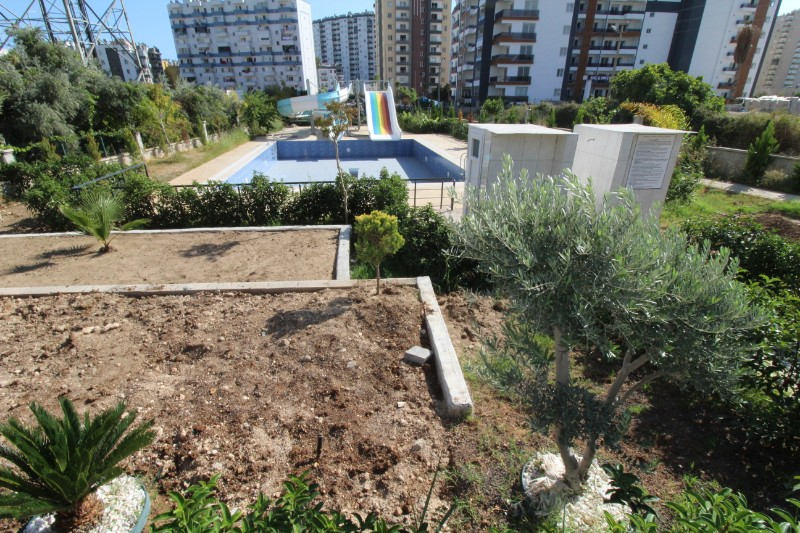 ASLAN'DAN TÖMÜK'TE SİTE İÇİ HAVUZLU SIFIR SATILIK 1+1