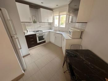 KÜÇÜK KAYMAKLI' DA ZEMİNKAT  SATILIK DAİRE