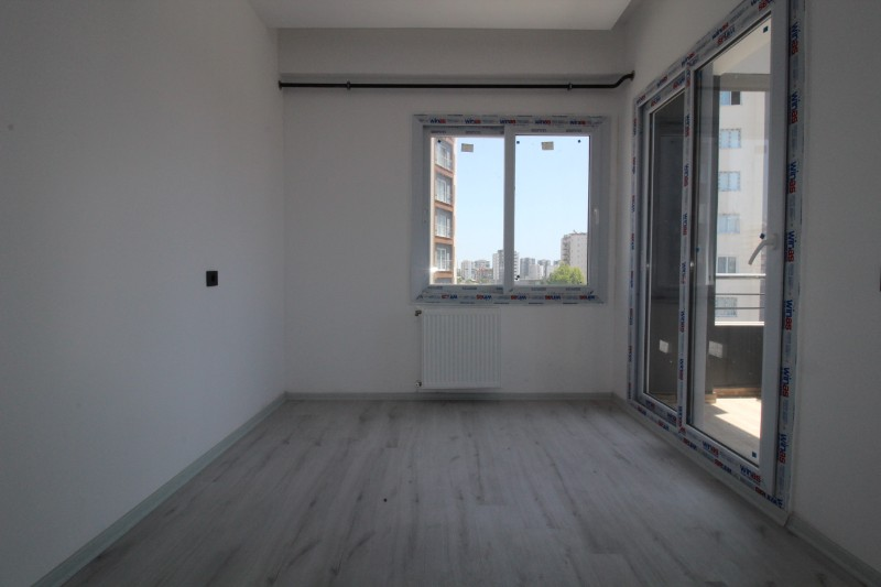 ASLAN'DAN MEZİTLİ DE ULAŞIMA YAKIN B.MUTFAK SIFIR 2+1