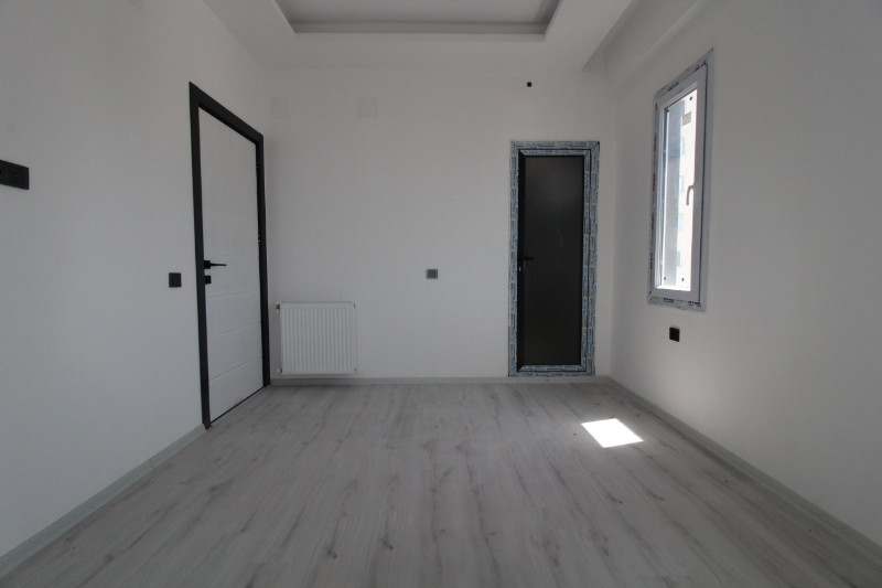 ASLAN'DAN MEZİTLİ DE ULAŞIMA YAKIN B.MUTFAK SIFIR 2+1