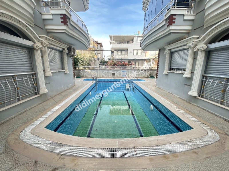 DİDİM ALTINKUM MAHALLESİNDE DENİZE YÜRÜME MESAFESİNDE ,DOĞA MANZARALI | HAVUZLU SİTEDE EŞYALI AYRI MUTFAKLI  SATILIK 2+1 DAİRE