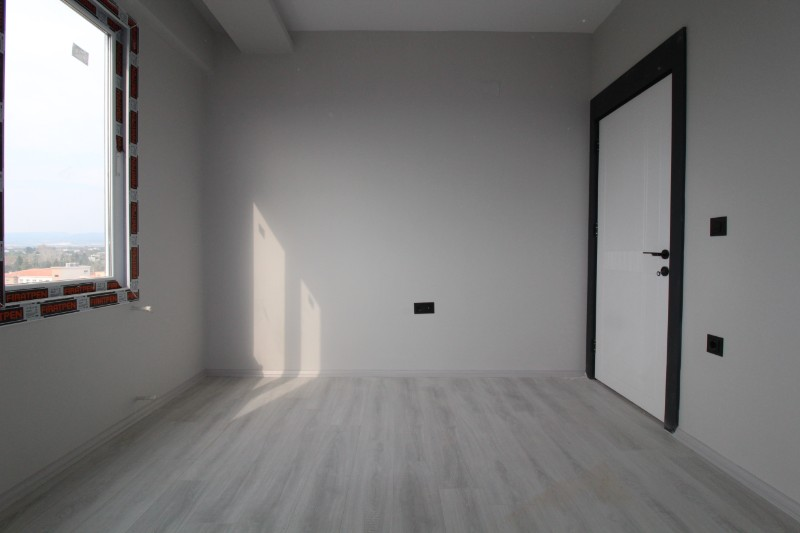 ASLAN'DAN DOĞA VE DENİZ MANZARALI GENİŞ METRAJLI SIFIR 2+1