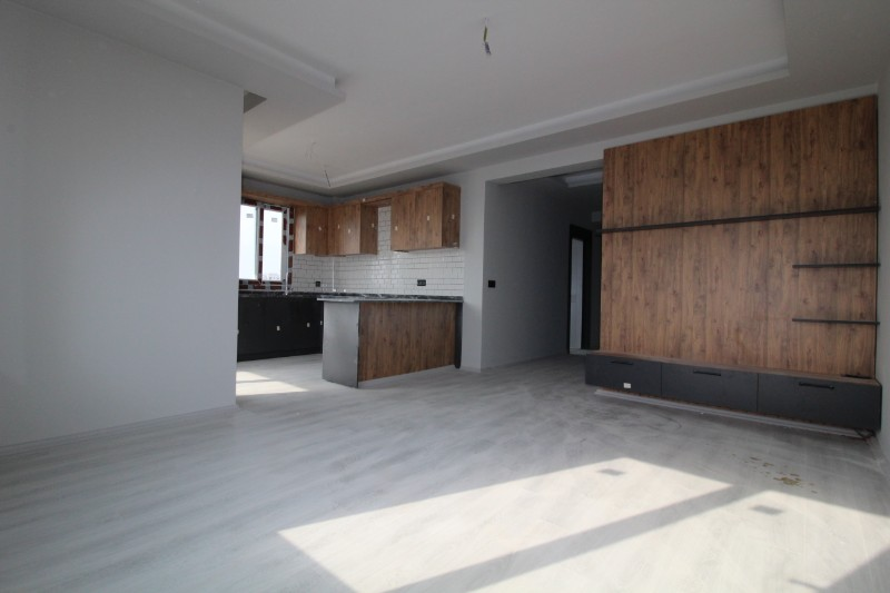 ASLAN'DAN DOĞA VE DENİZ MANZARALI GENİŞ METRAJLI SIFIR 2+1