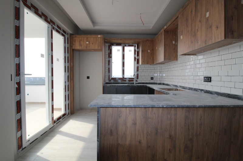 ASLAN'DAN DOĞA VE DENİZ MANZARALI GENİŞ METRAJLI SIFIR 2+1