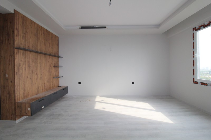 ASLAN'DAN DOĞA VE DENİZ MANZARALI GENİŞ METRAJLI SIFIR 2+1