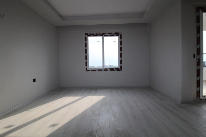 ASLAN'DAN DOĞA VE DENİZ MANZARALI GENİŞ METRAJLI SIFIR 2+1