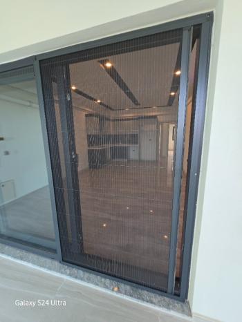 KUŞADASINDA DOGALĞAZLI HAVUZLU SATILIK 2+1DAİRE