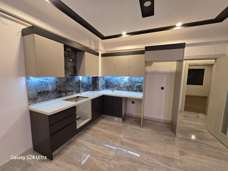 KUŞADASINDA DOGALĞAZLI HAVUZLU SATILIK 2+1DAİRE