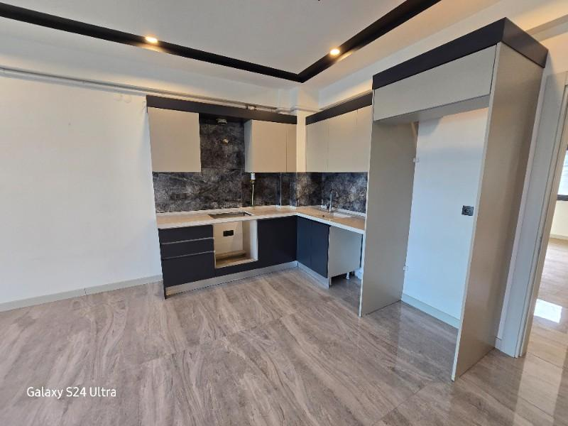 KUŞADASINDA DOGALĞAZLI HAVUZLU SATILIK 2+1DAİRE