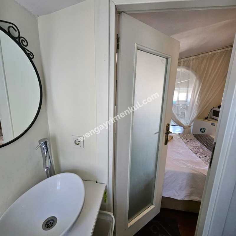 TEVFİK TURA APT 1+0 50 m2 EŞYALI KİRALIK ÇATI KATI DAİRE