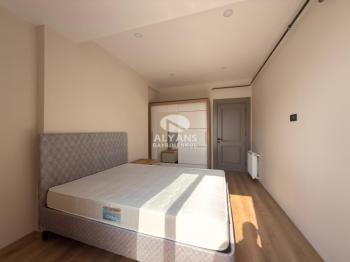 ALYANS'TAN YENİŞEHİR'DE TEK BLOK OTOPARKLI JENERATÖRLÜ 1+1