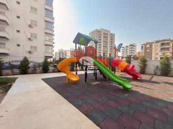 ALYANS'TAN YENİŞEHİR'DE TEK BLOK OTOPARKLI JENERATÖRLÜ 1+1