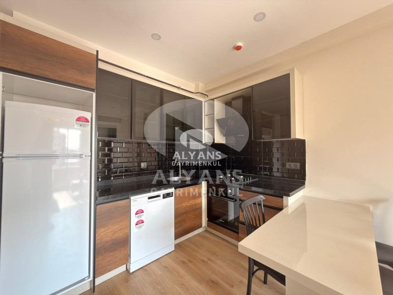 ALYANS'TAN YENİŞEHİR'DE TEK BLOK OTOPARKLI JENERATÖRLÜ 1+1