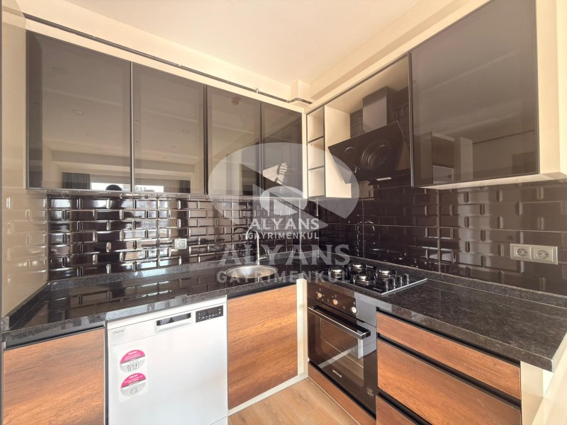 ALYANS'TAN YENİŞEHİR'DE TEK BLOK OTOPARKLI JENERATÖRLÜ 1+1