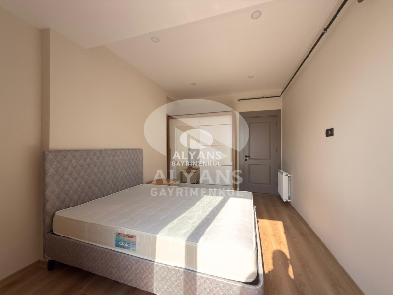 ALYANS'TAN YENİŞEHİR'DE TEK BLOK OTOPARKLI JENERATÖRLÜ 1+1