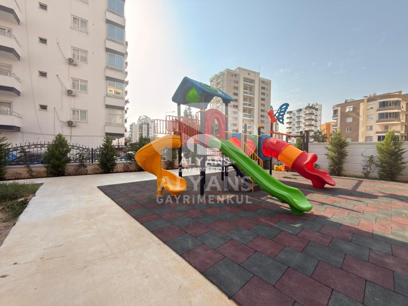 ALYANS'TAN YENİŞEHİR'DE TEK BLOK OTOPARKLI JENERATÖRLÜ 1+1