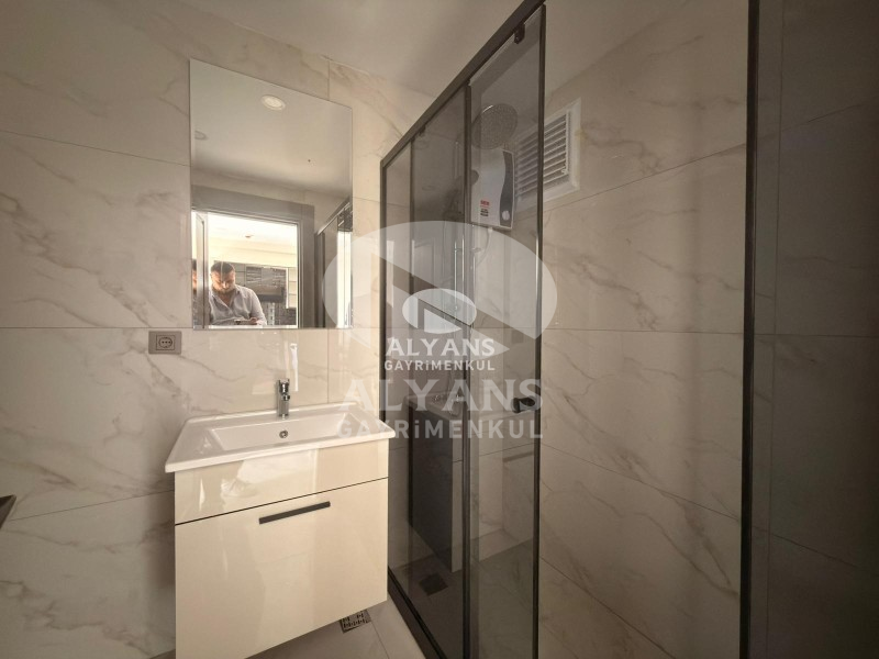 ALYANS'TAN YENİŞEHİR'DE TEK BLOK OTOPARKLI JENERATÖRLÜ 1+1