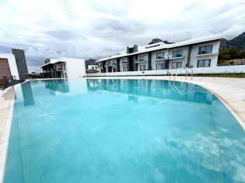 Girne Karaoğlanoğlu Havuzlu Sitede Full Eşyalı Deniz Manzaralı 1+1 Bahçe Kullanımlı Kiralık Daireler