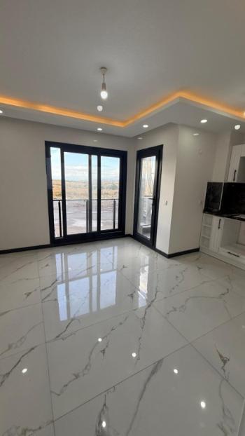 DİDİM HİSAR MAHALLESİNDE DENİZE YAKIN SIFIR 2+1 SATILIK DAİRE