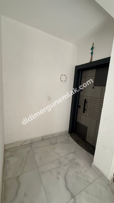 DİDİM HİSAR MAHALLESİNDE DENİZE YAKIN SIFIR 2+1 SATILIK DAİRE