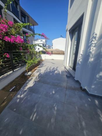 DİDİM HİSAR MAHALLESİNDE DENİZ MANZARALI  GENİŞ BAHÇELİ SIFIR 3+1 SATILIK VİLLA