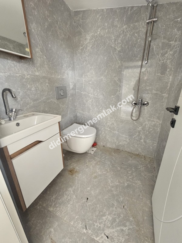 DİDİM HİSAR MAHALLESİNDE DENİZ MANZARALI  GENİŞ BAHÇELİ SIFIR 3+1 SATILIK  VİLLA