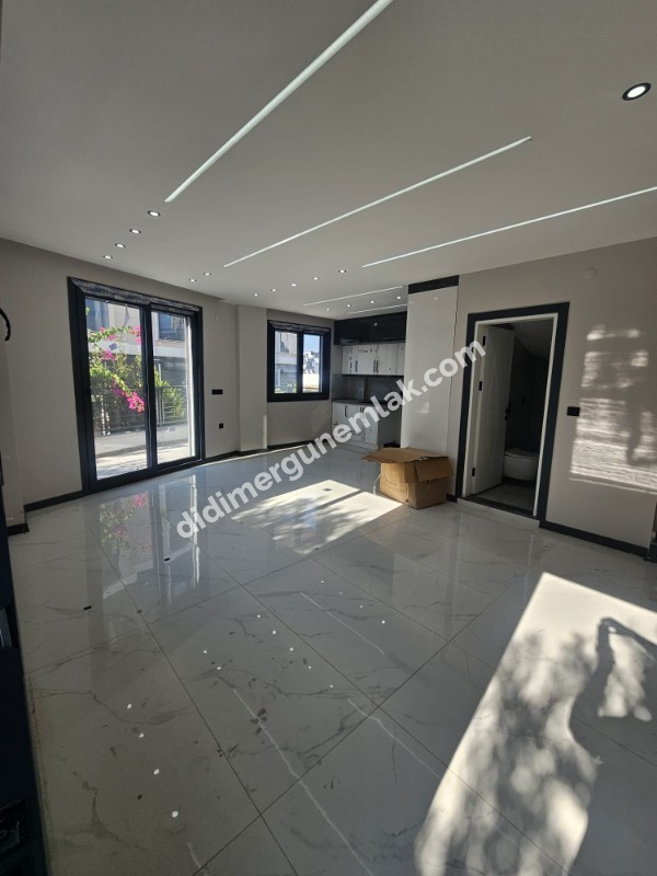 DİDİM HİSAR MAHALLESİNDE DENİZ MANZARALI  GENİŞ BAHÇELİ SIFIR 3+1 SATILIK  VİLLA