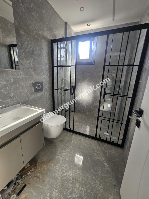 DİDİM HİSAR MAHALLESİNDE DENİZ MANZARALI  GENİŞ BAHÇELİ SIFIR 3+1 SATILIK  VİLLA